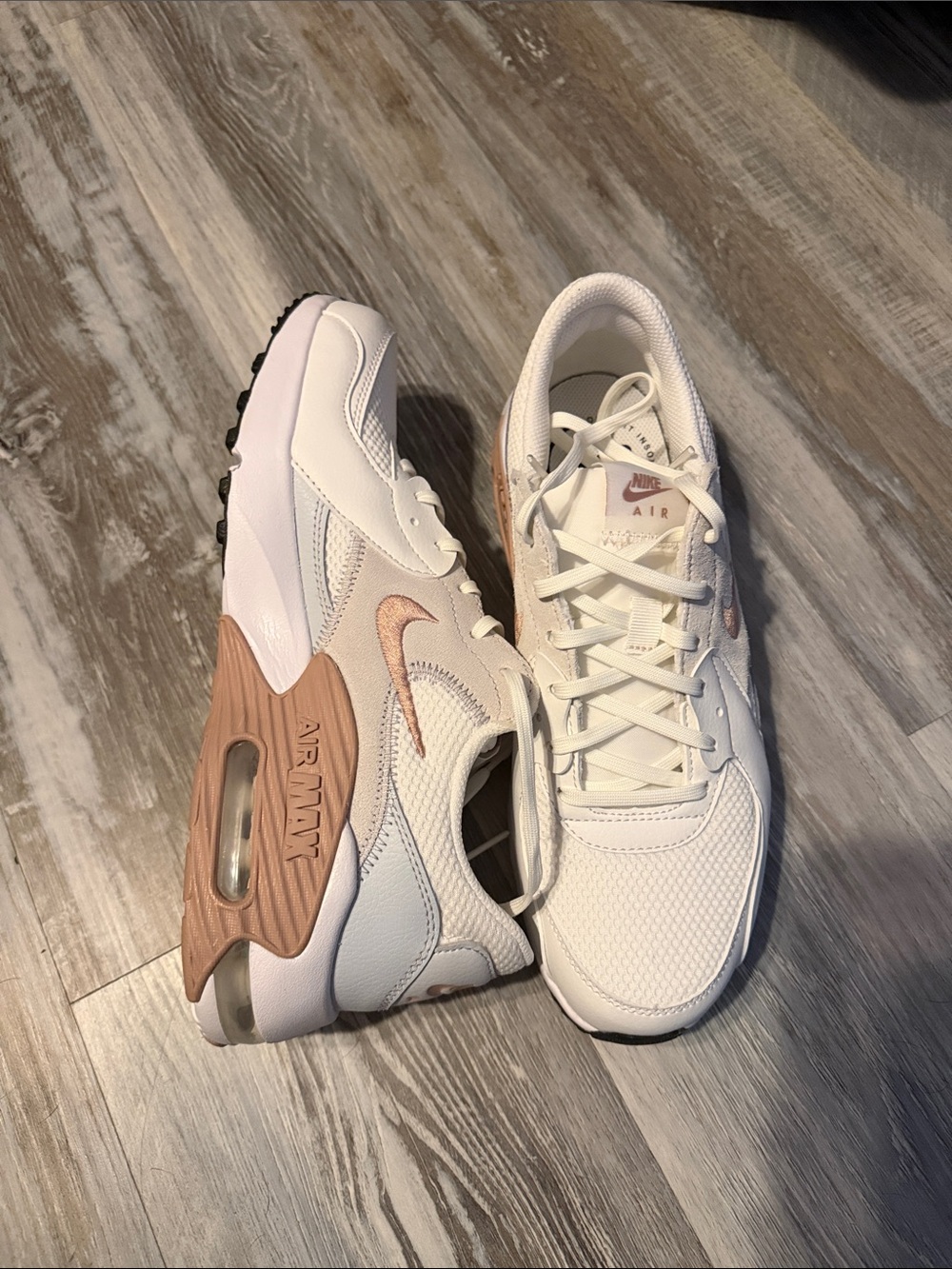 Nike Women's White Sneakers with Rose Gold Accents